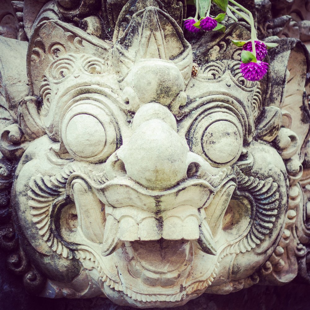 Balinese demon with flowers